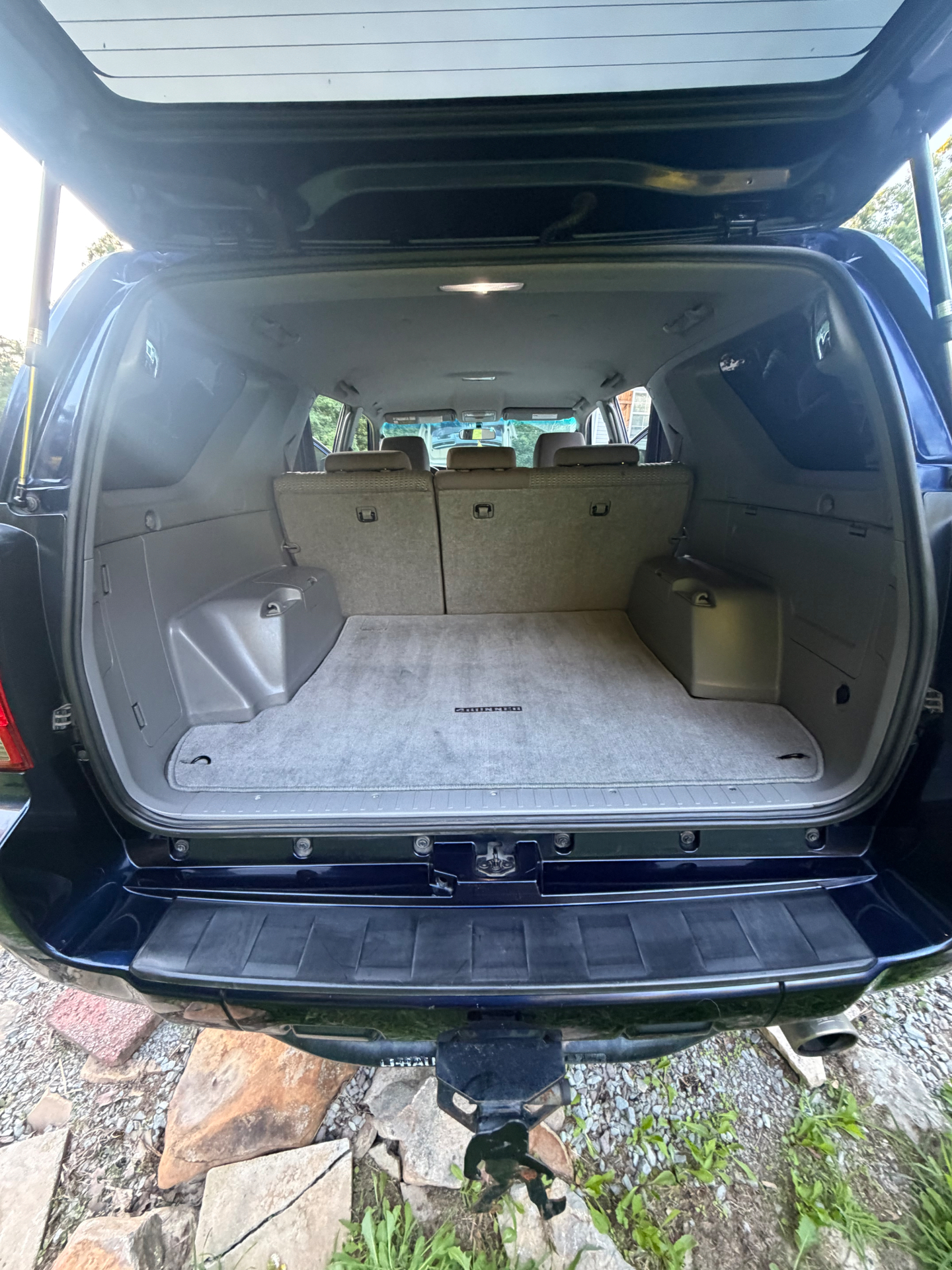 Detailed SUV cargo area showing a clean interior finish.